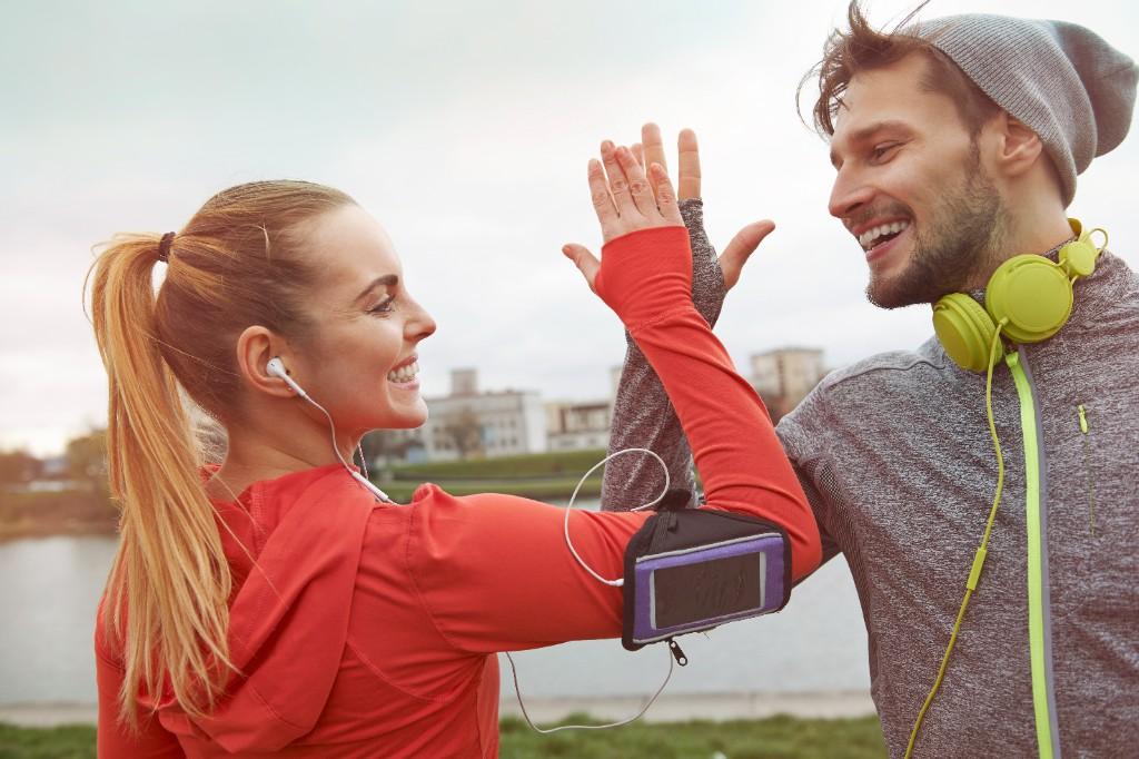 Active couple celebrating wellness outdoors in New York